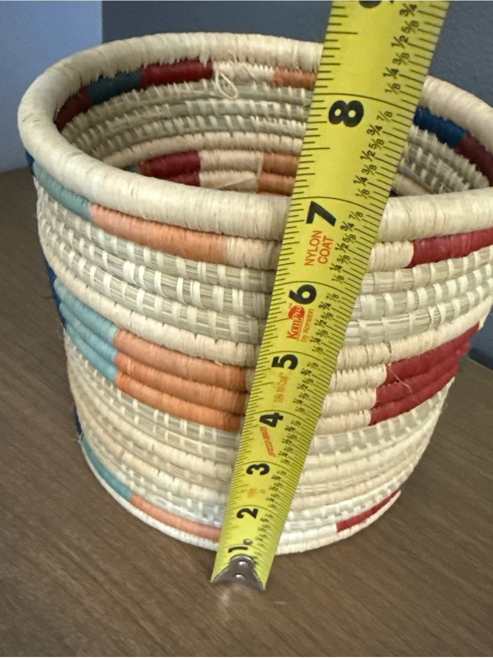 Handwoven Natural Basket with Red and Blue Accents